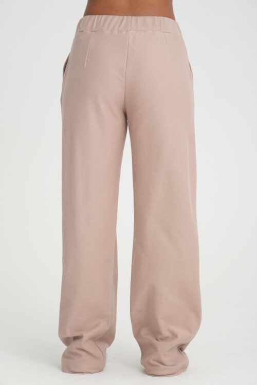 high-waisted flared sweatpants beige back view
